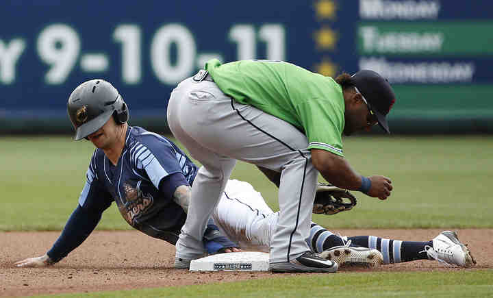 Columbus Clippers center fielder Brandon Barnes steals second during the sixth inning of a game against the Gwinnett Stripers at Huntington Park in Columbus.   (Joshua A. Bickel / The Columbus Dispatch)